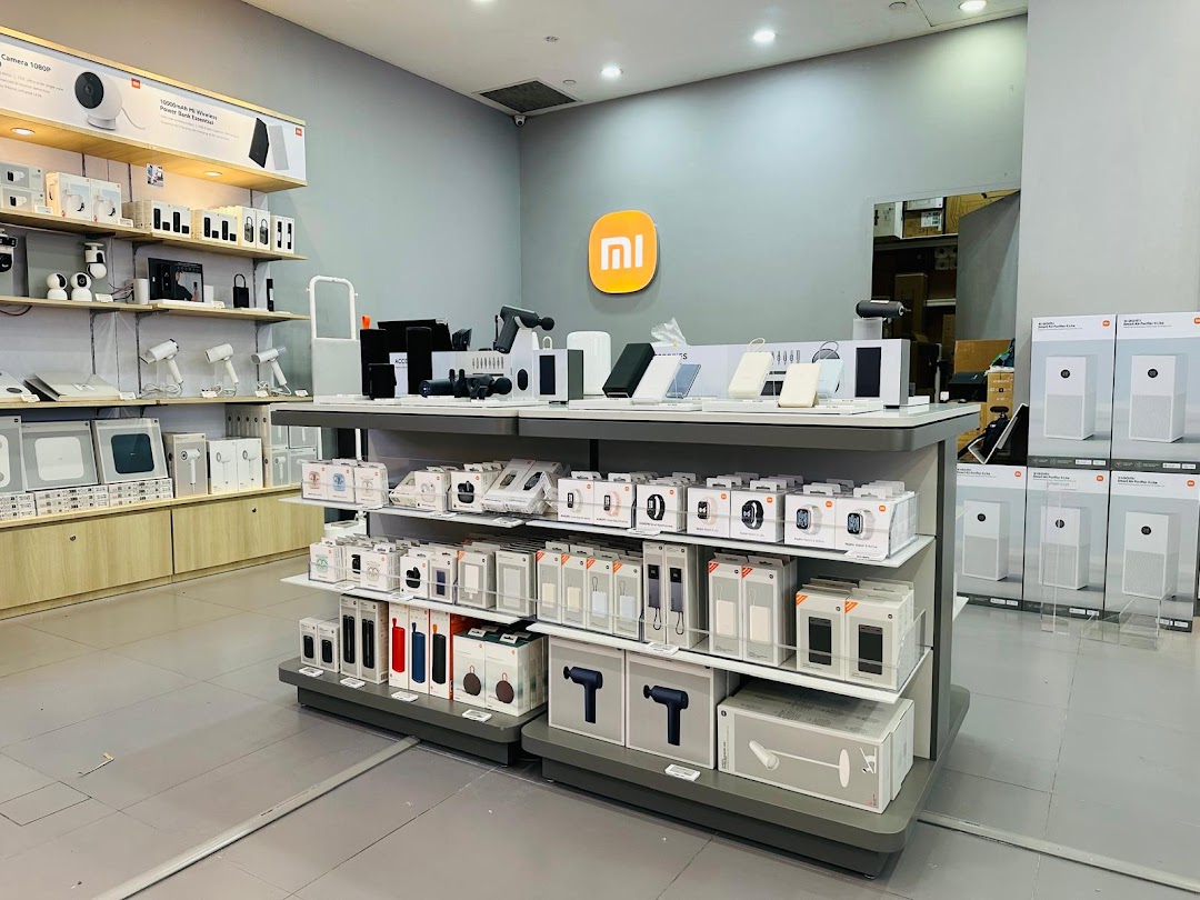 Interior view of a Xiaomi store with various electronic products on display.