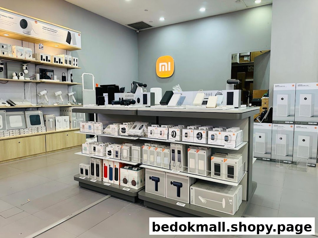 Interior view of a Xiaomi store with various electronic products on display.