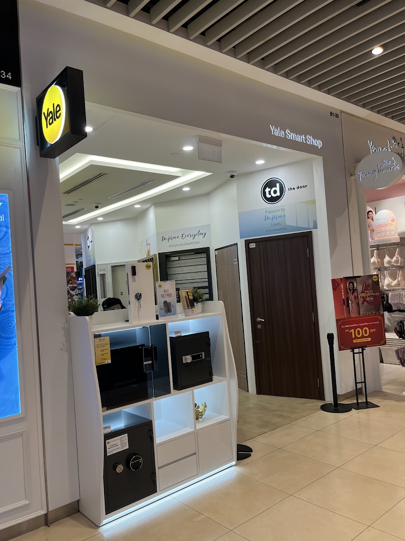 Entrance of Yale Smart Shop with product display and signage.