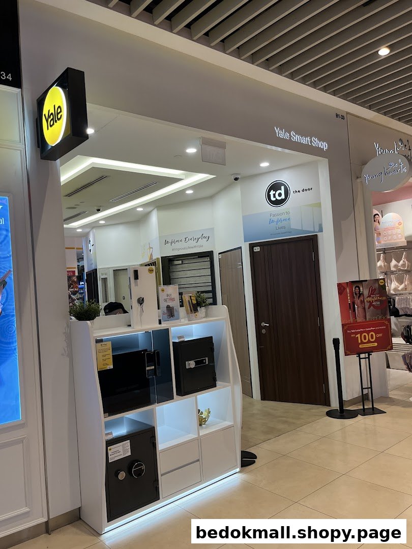 Entrance of Yale Smart Shop with product display and signage.
