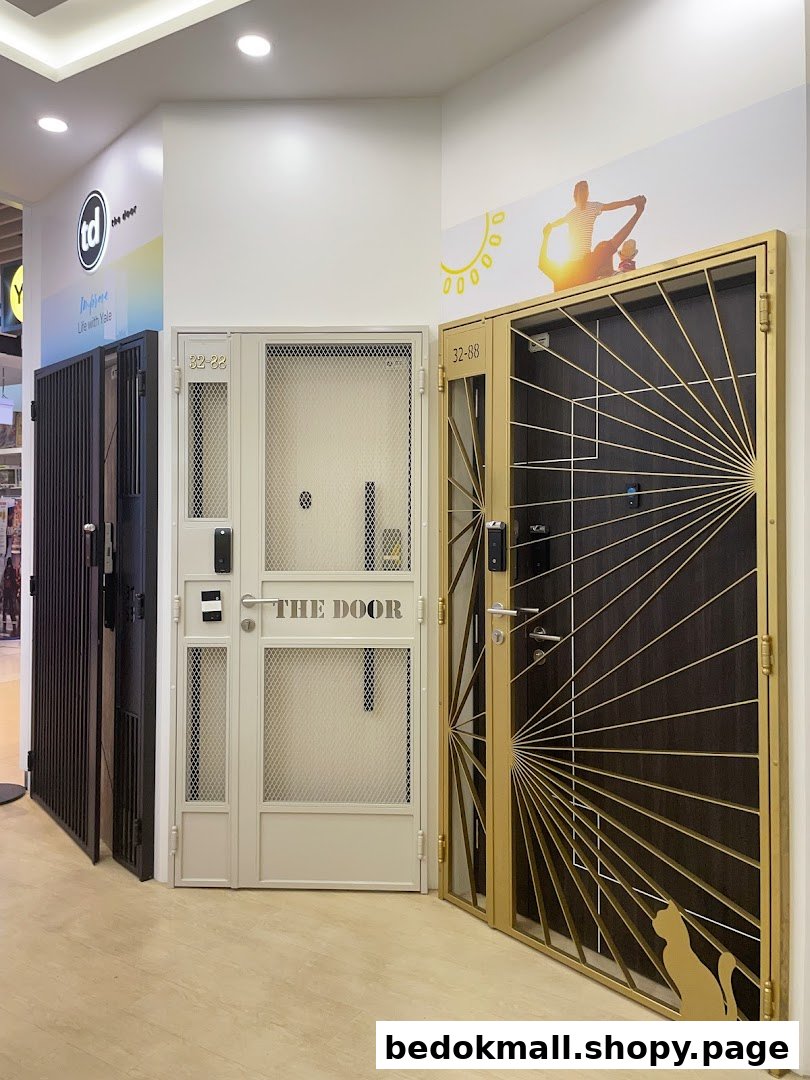 Multiple security doors and gates displayed inside a retail shop.