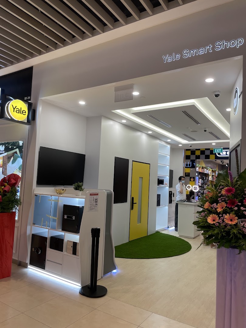 Shop front of Yale Smart Shop showing interior displays and staff.