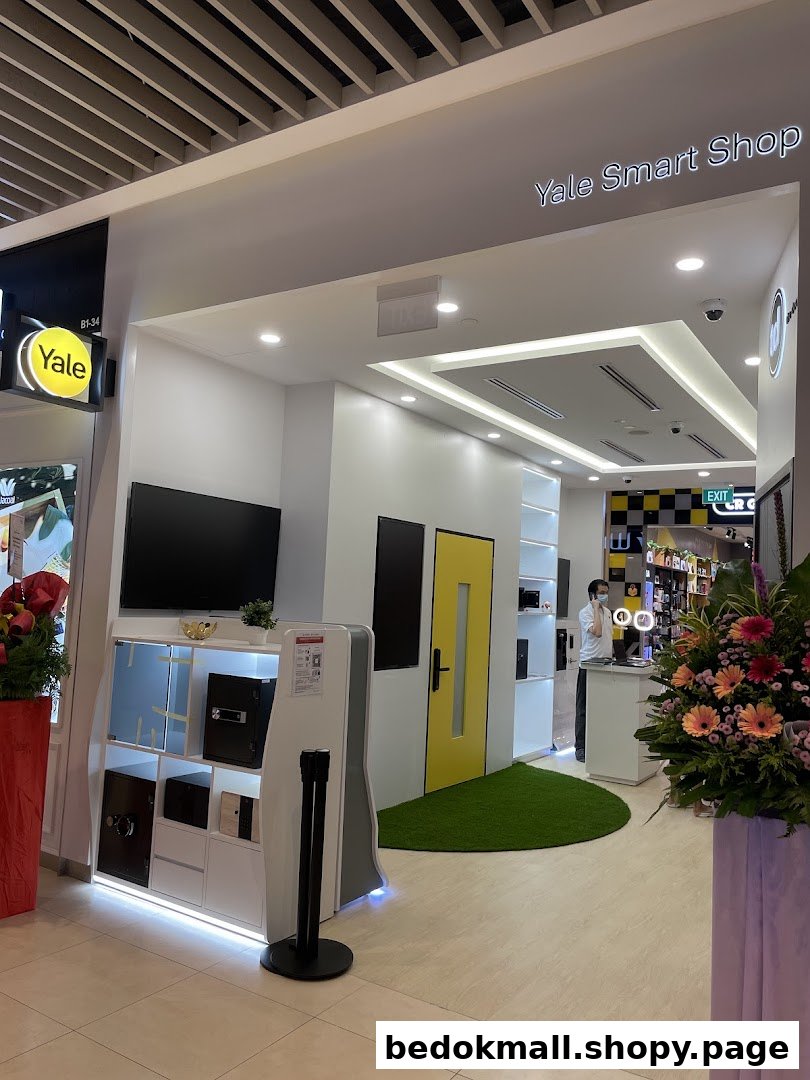 Shop front of Yale Smart Shop showing interior displays and staff.