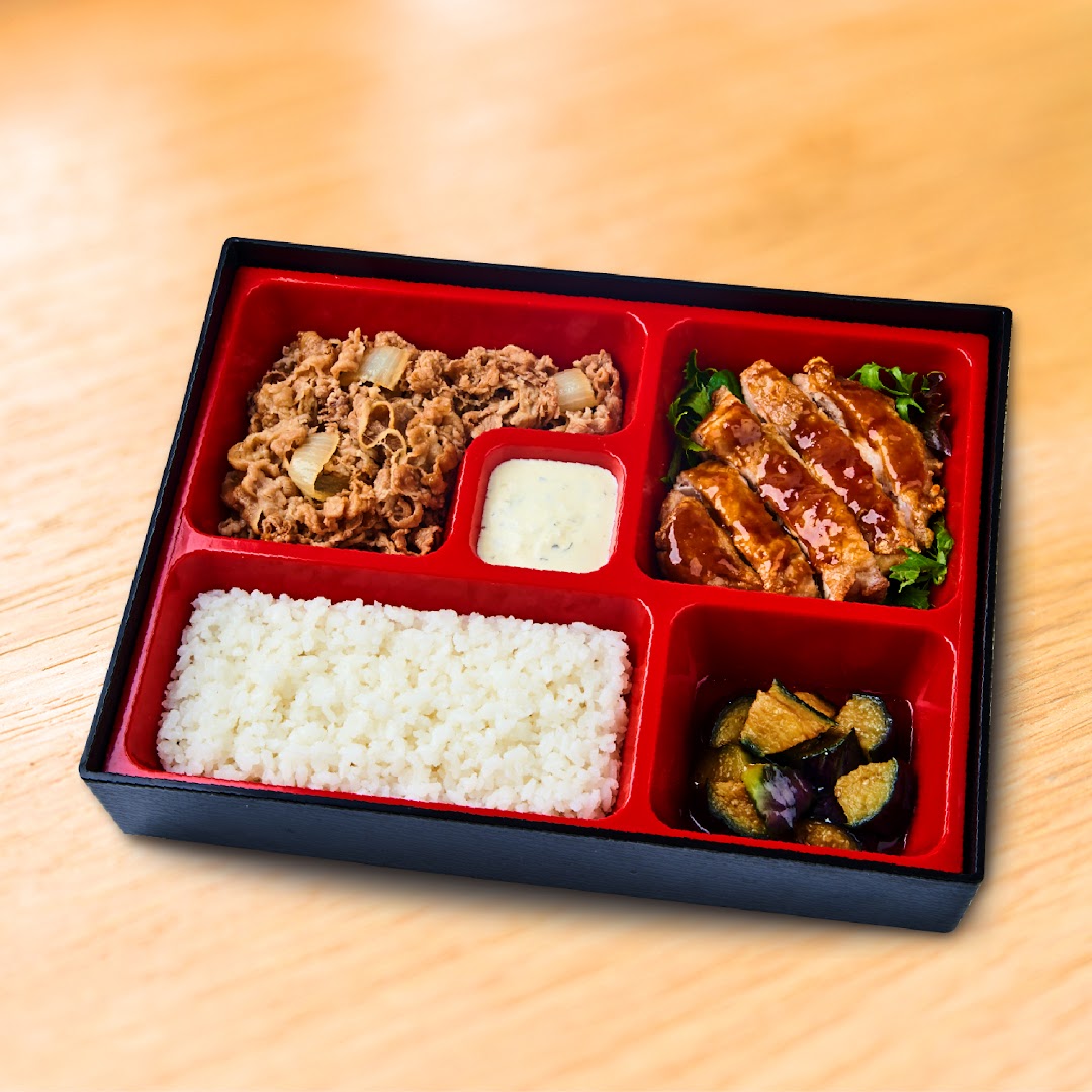 A bento box filled with rice, beef, chicken, and vegetables.