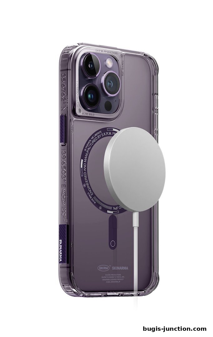 A transparent phone case with a magnetic charger attached to the back.