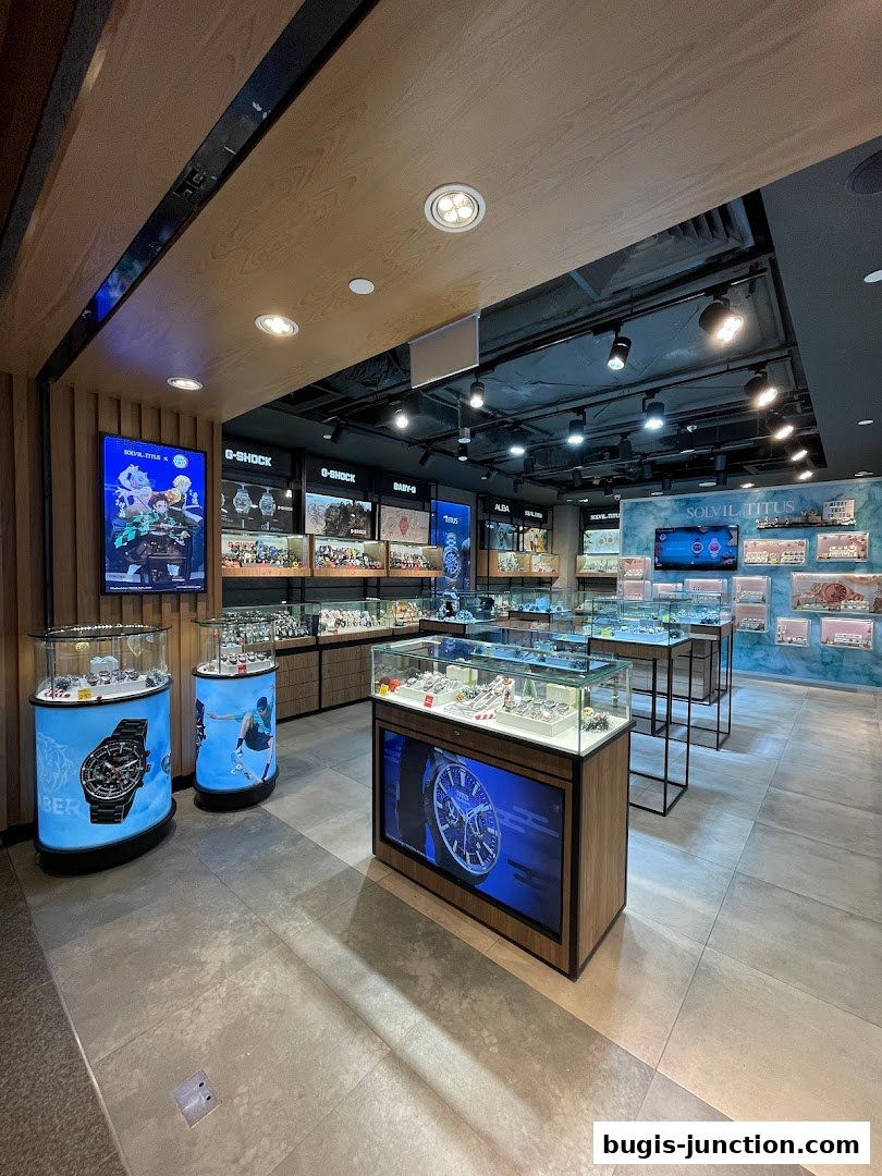Interior view of a modern watch store showcasing various brands and display cases.