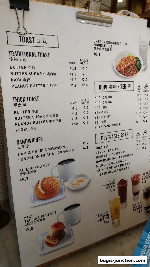 A menu from Toast Box Bugis Junction featuring traditional toast, thick toast, sandwiches, and beverages.