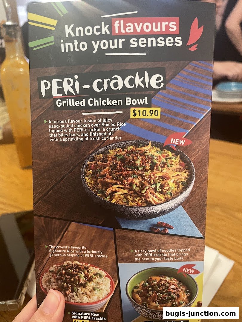 A menu featuring Nandos PERi-crackle Grilled Chicken Bowl and other dishes.