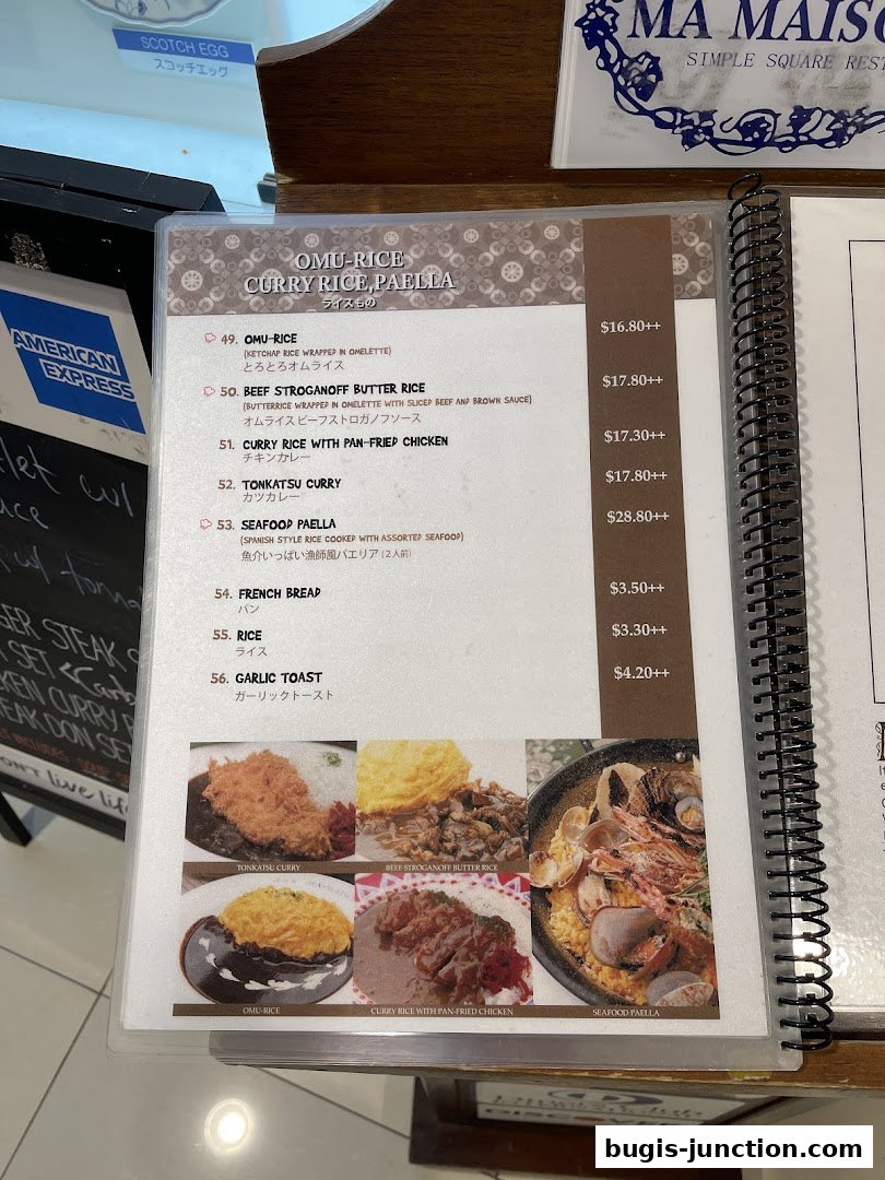A menu from MA MAISON restaurant featuring Omu-Rice, Curry Rice, and Paella dishes with accompanying photos.