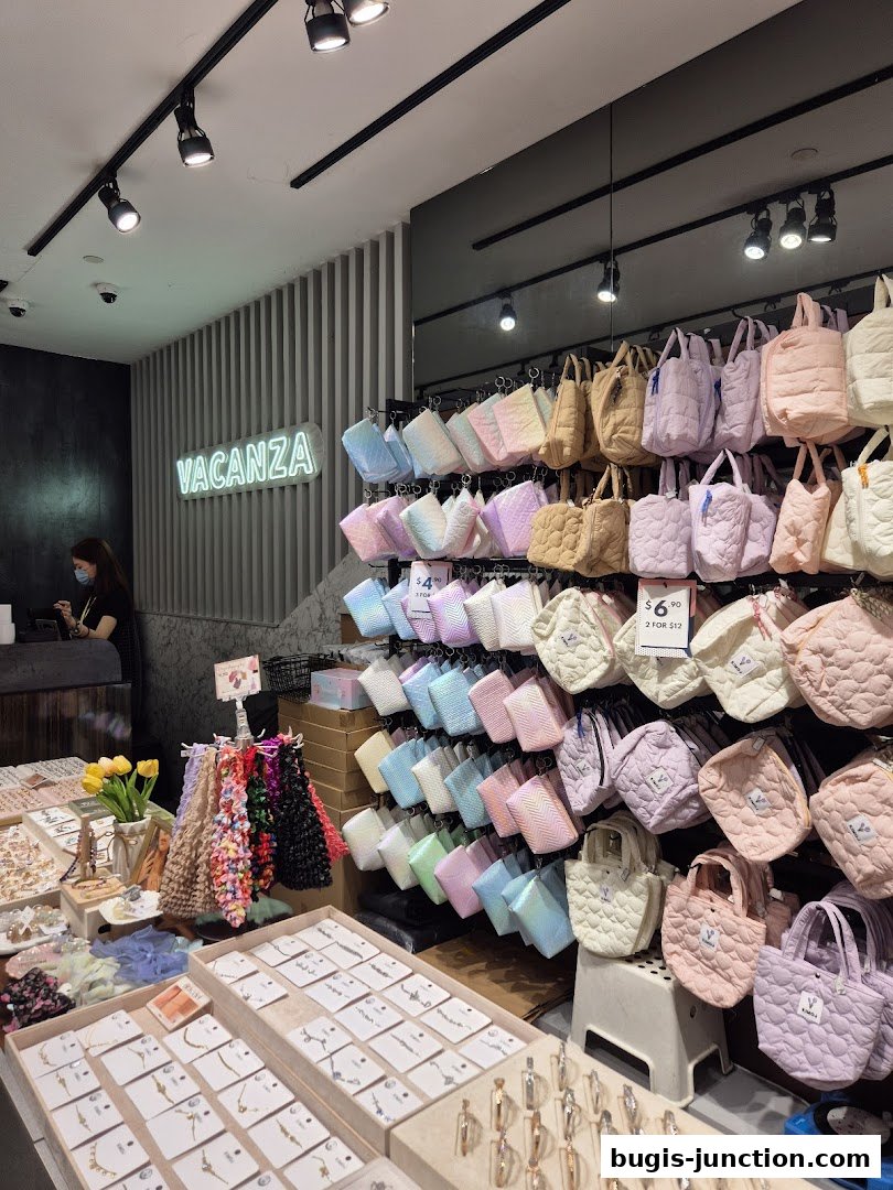 Interior view of Vacanza shop showcasing colorful bags and accessories.