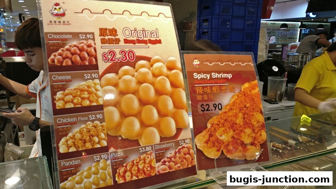 A display board showing various flavors of Hong Kong Egglets with prices.