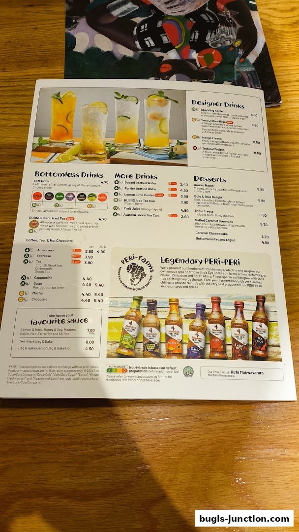A menu from Nando's featuring drinks, desserts, coffee, tea, and sauces, with a section on Legendary PERi-PERi.