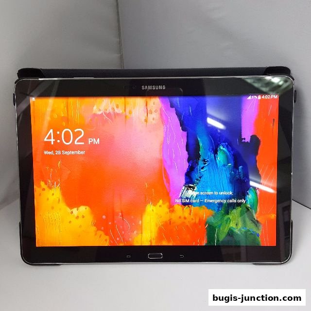 A Samsung tablet with a colorful abstract wallpaper is displayed.