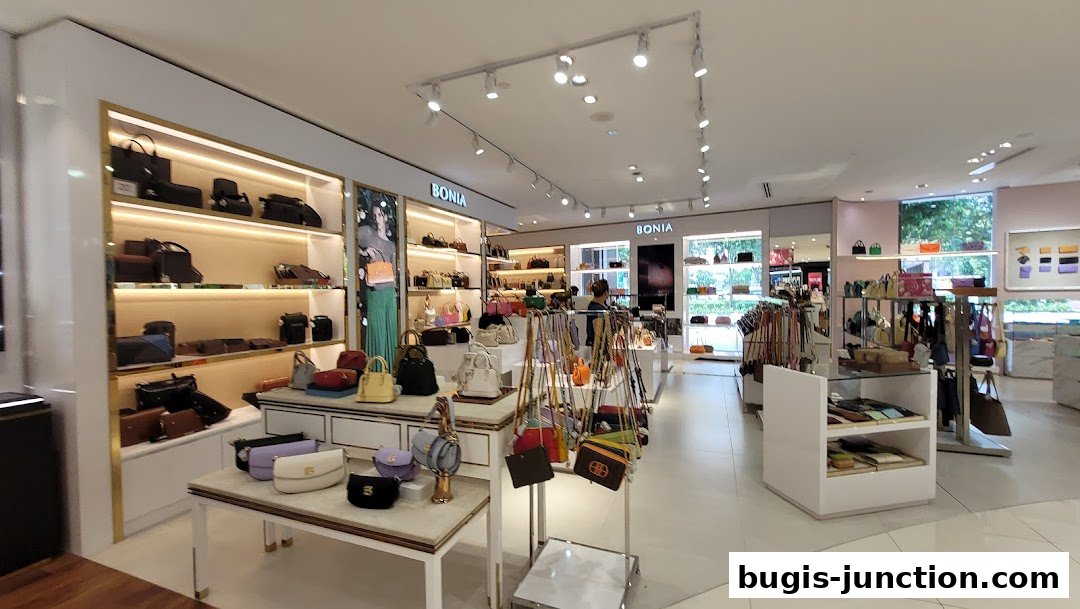 Interior view of a Bonia store showcasing a wide selection of handbags and accessories.