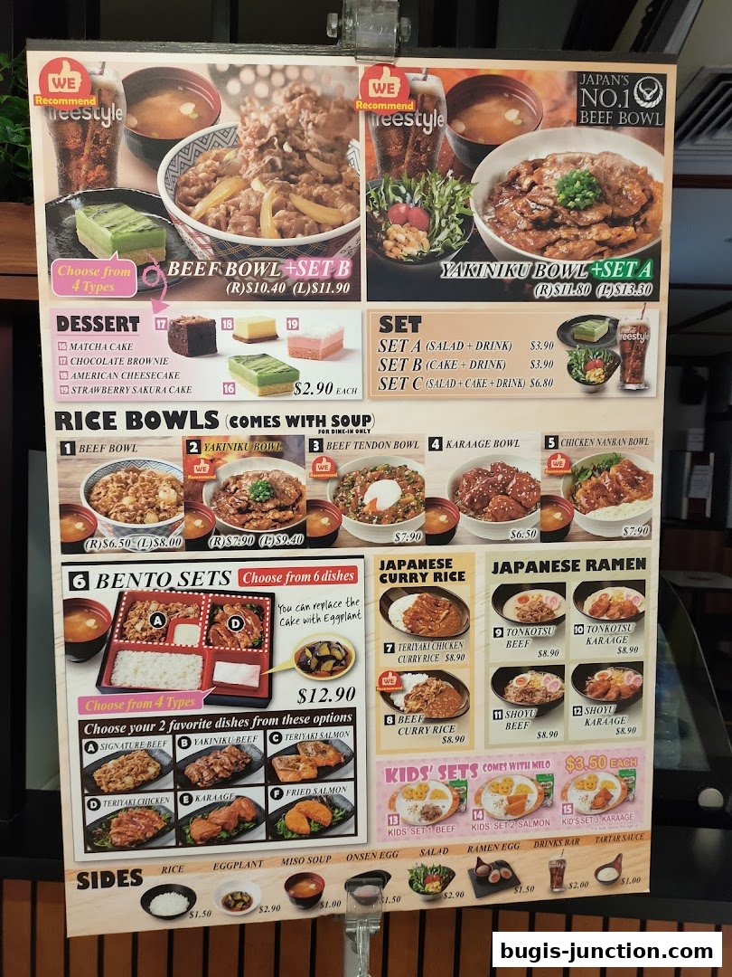 A menu board for Yoshinoya featuring beef bowls, bento sets, curry rice, ramen, and kids' meals.