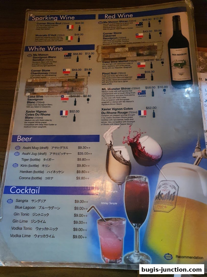 A menu featuring sparkling wine, red wine, white wine, beer, and cocktails with prices.