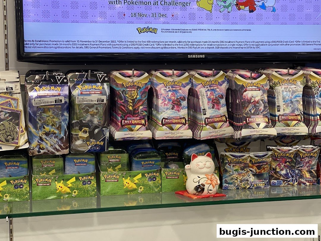 A display of Pokémon trading card game booster packs and boxes at Challenger.