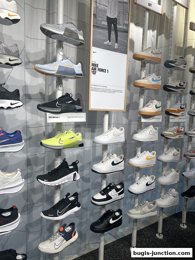 A wall display showcasing a variety of Nike athletic shoes, including Air Force 1 models.