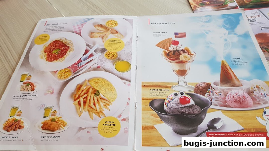 A menu from Swensens featuring kid's meals and ice cream sundaes.