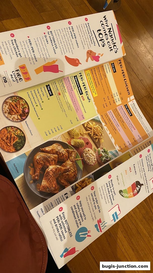 A Nando's menu featuring flame-grilled PERi-PERi chicken and various bowls.