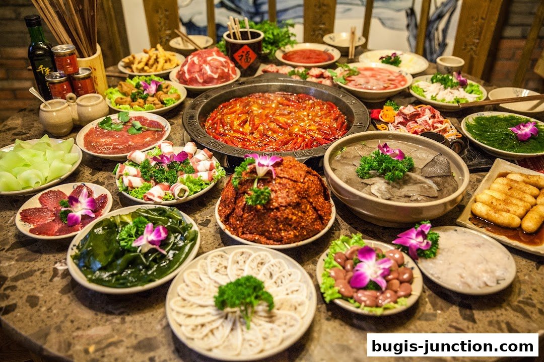 A table laden with a variety of hotpot ingredients and dishes, showcasing a vibrant culinary experience.
