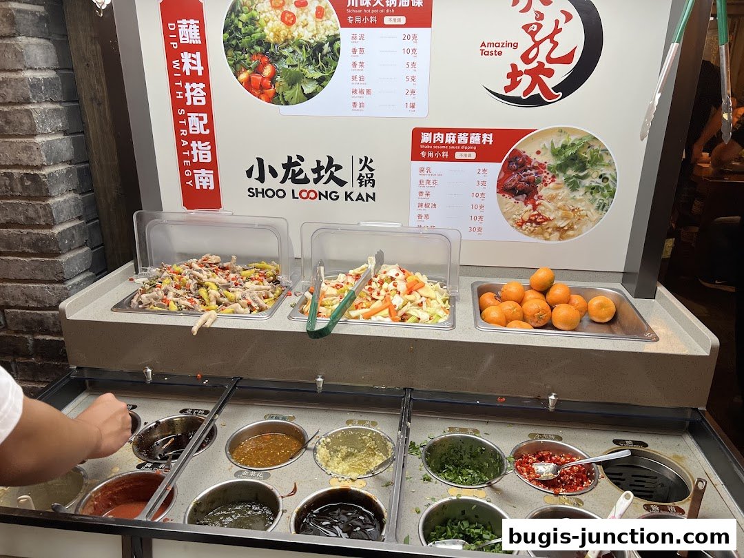 A display of various dipping sauces and ingredients for hotpot at Xiao Long Kan.