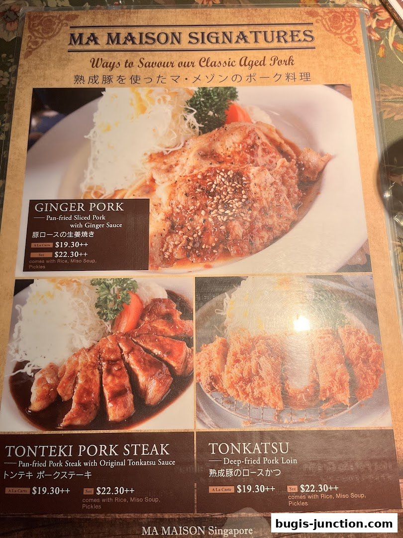 A menu featuring signature aged pork dishes from MA MAISON, including Ginger Pork, Tonteki Pork Steak, and Tonkatsu.