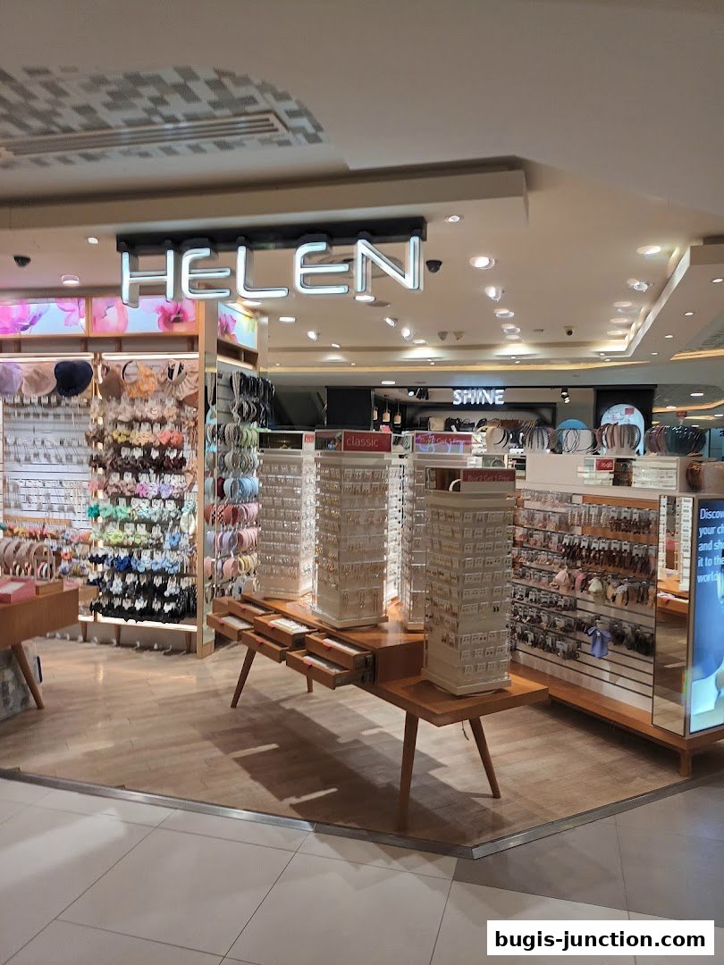 A well-lit shop interior displaying a wide variety of accessories and jewelry.