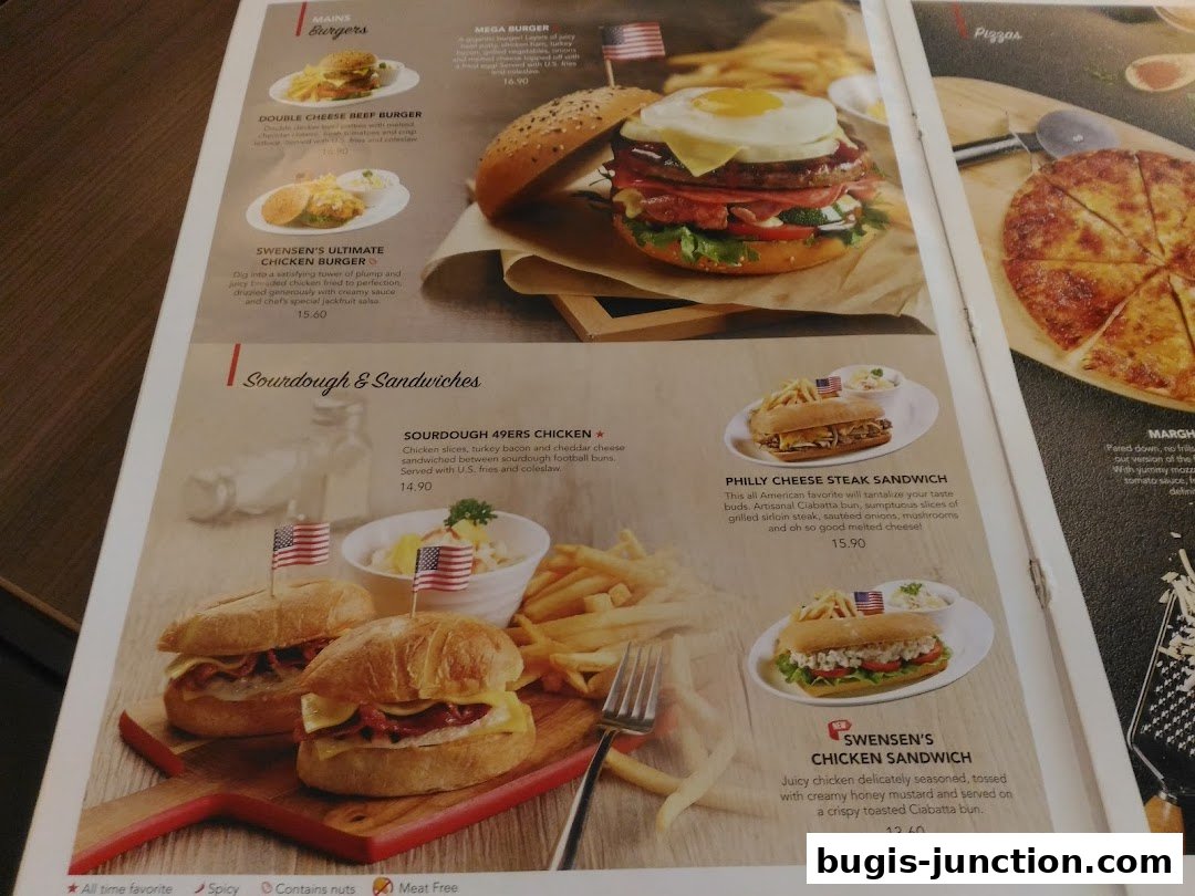 A menu page featuring burgers, sandwiches, and pizzas with appetizing food photography.