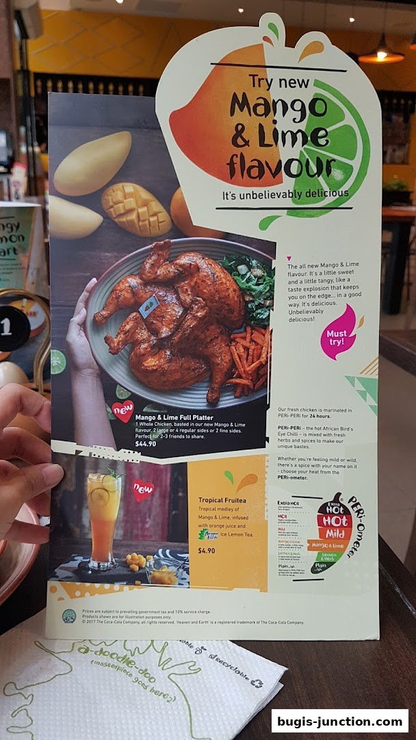 A menu featuring Nandos' new Mango & Lime PERi-PERi chicken and Tropical Fruitea.