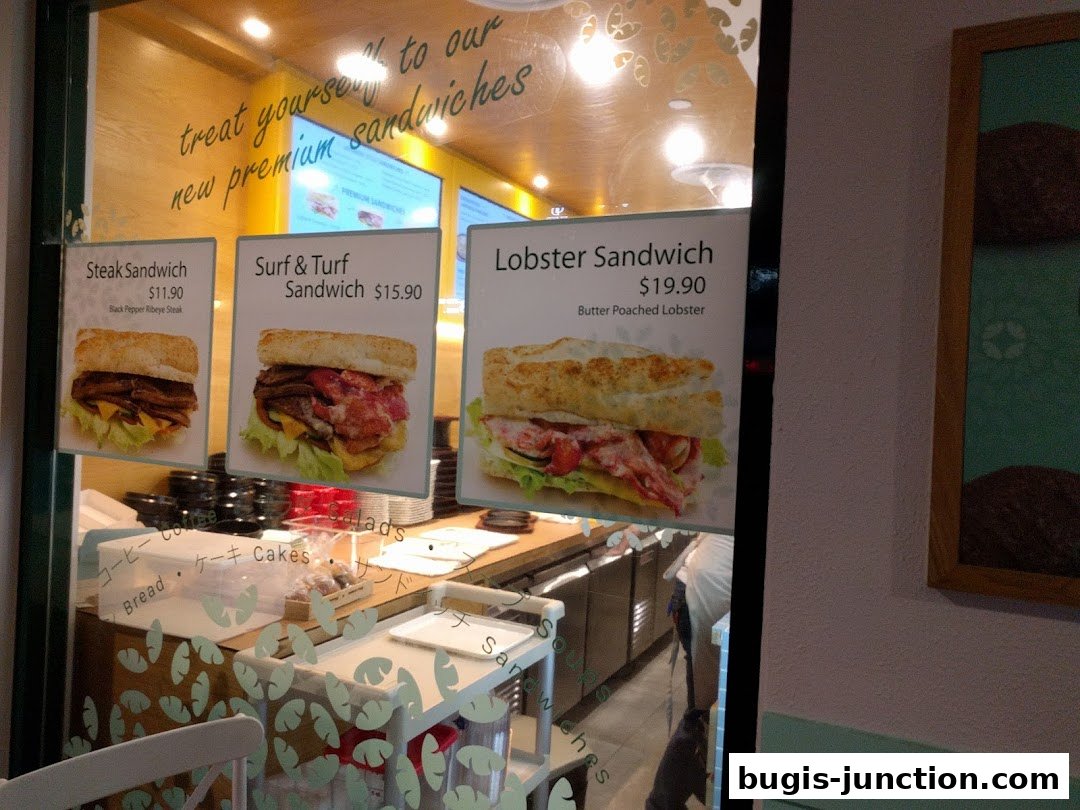 A shop window displaying premium sandwiches with enticing descriptions and prices.