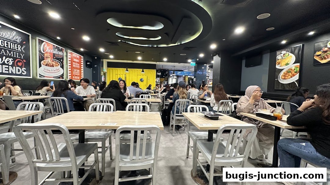 Interior view of Eighteen Chefs Bugis Junction with diners seated at tables.