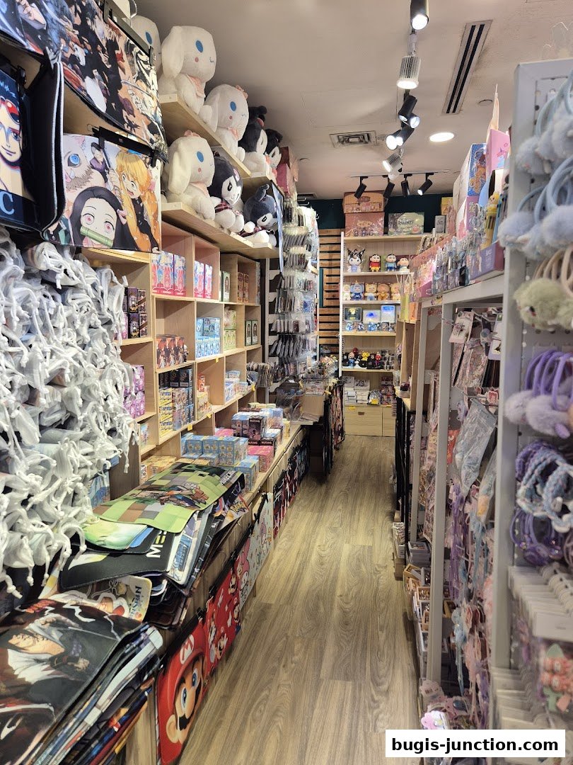 Interior view of a retail shop filled with anime merchandise, plush toys, and accessories.
