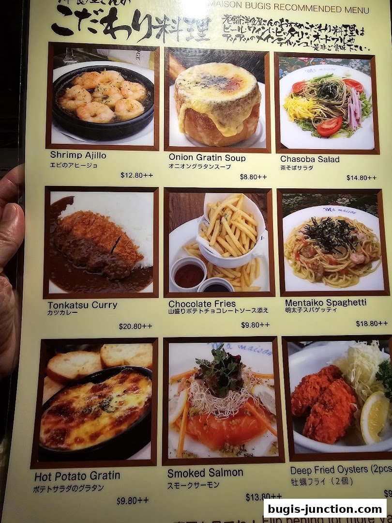 A menu page showcasing various Japanese and Western-inspired dishes with appealing food photography.