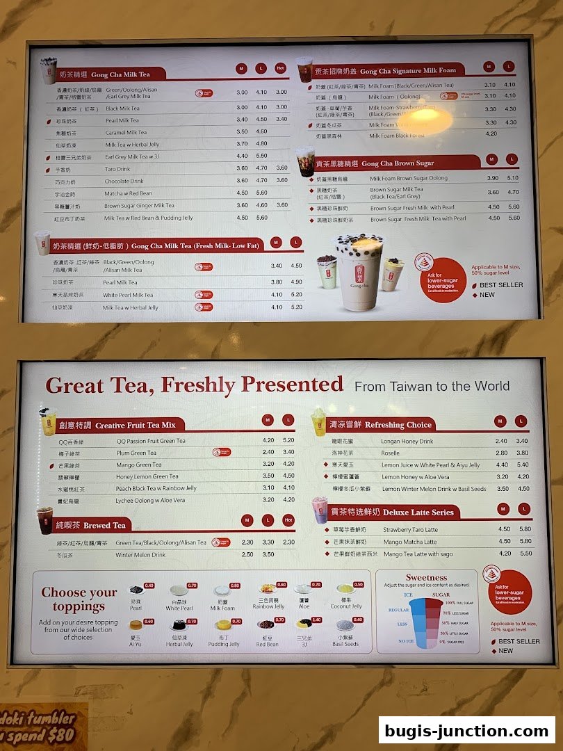 A menu board displaying various milk teas, fruit teas, and latte series with prices.