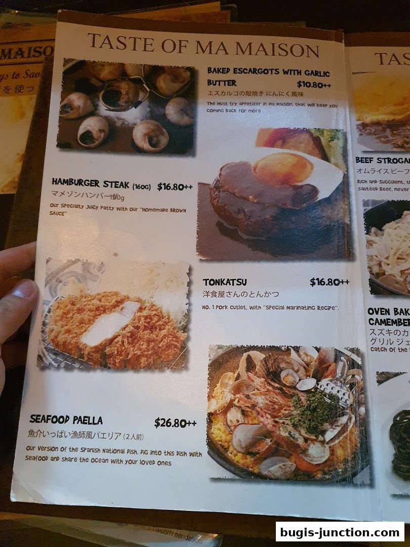 A menu from MA MAISON featuring various dishes with images and descriptions.