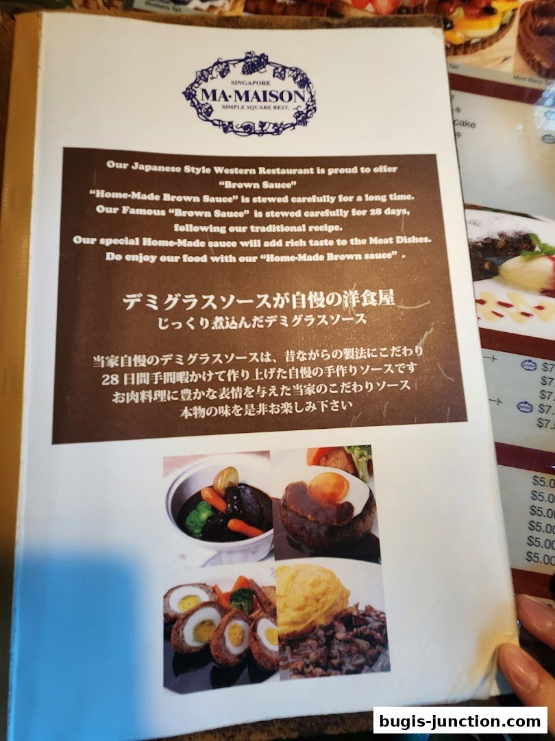 A menu from MA MAISON restaurant featuring Japanese-style Western cuisine and their signature brown sauce.