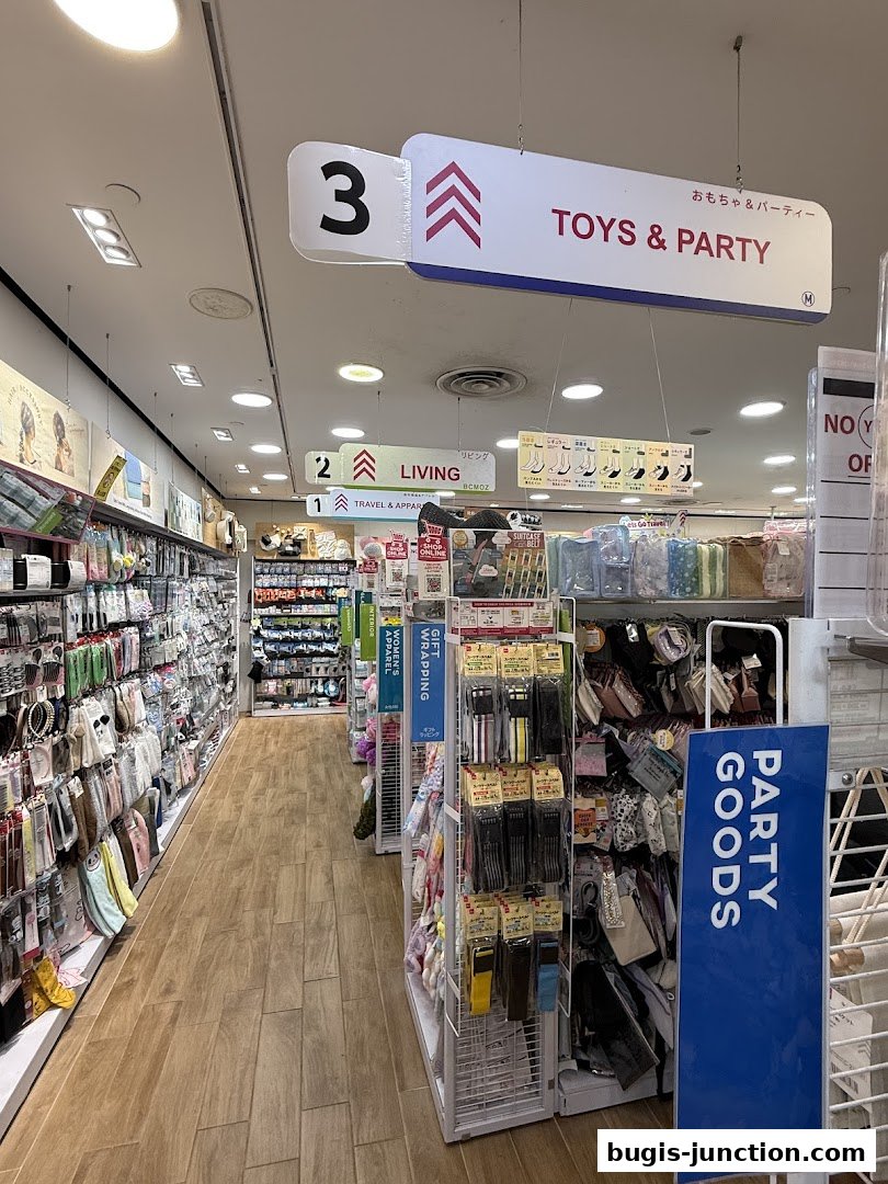 A wide aisle inside a Daiso store, showcasing various merchandise and directional signs.