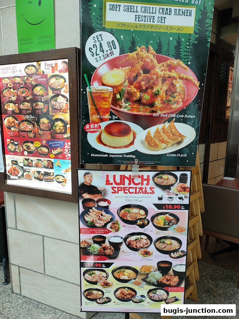 A display of ramen sets and lunch specials outside a restaurant.