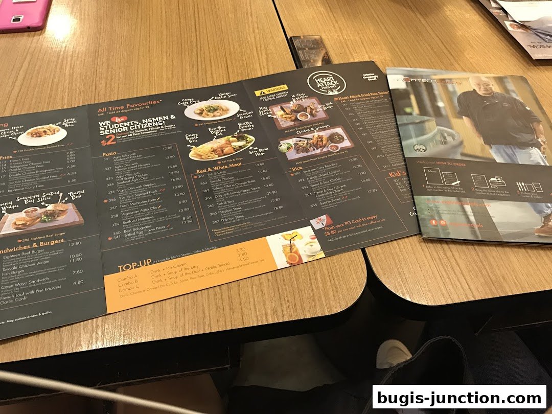 A menu from Eighteen Chefs Bugis Junction with various food items and prices.