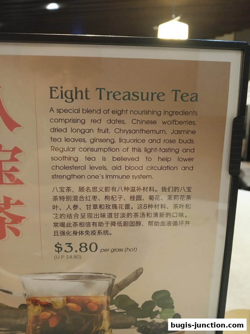 A menu item for Eight Treasure Tea with its ingredients and price.