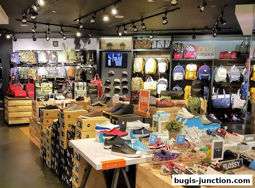 Interior view of a retail store showcasing a wide selection of backpacks, shoes, and accessories.
