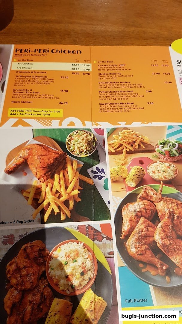 A menu from Nandos featuring PERI-PERI chicken dishes with prices and descriptions.