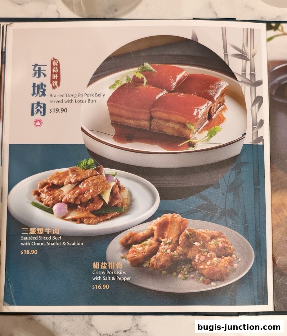 A menu page showcasing three popular Chinese dishes: Braised Dong Po Pork Belly, Sautéed Sliced Beef, and Crispy Pork Ribs.