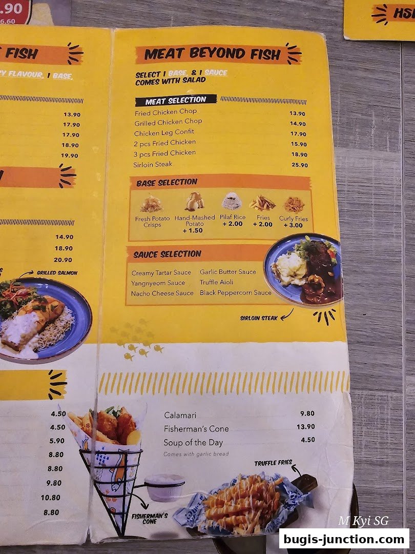 A menu from Big Fish Small Fish Bugis Junction featuring meat dishes, bases, and sauces.