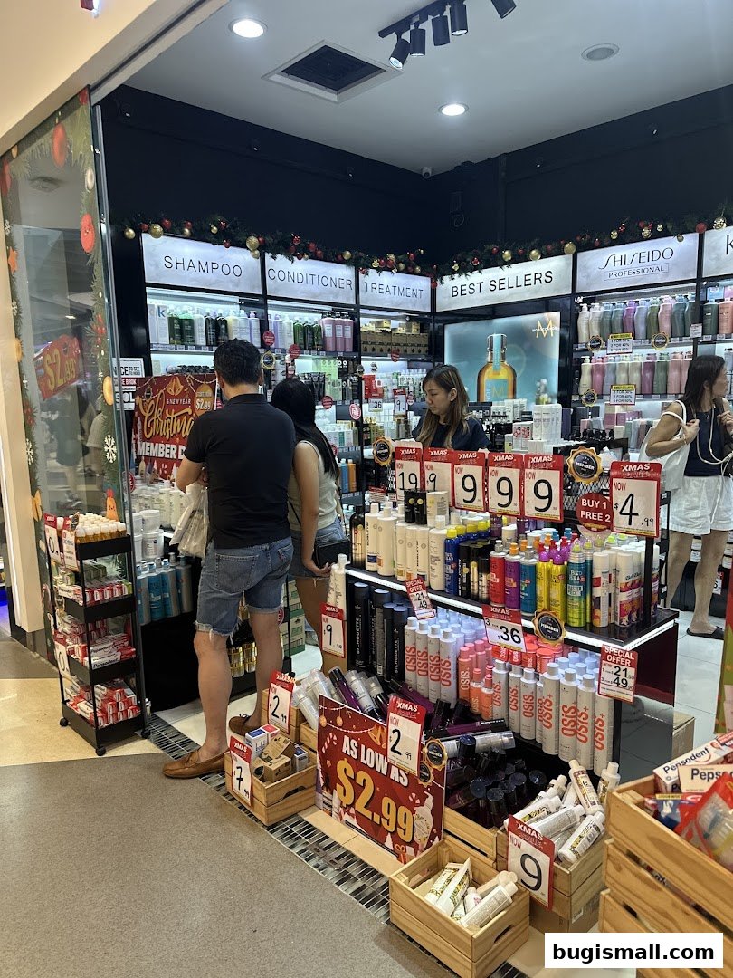People shopping for beauty products at a well-stocked store with Christmas decorations.