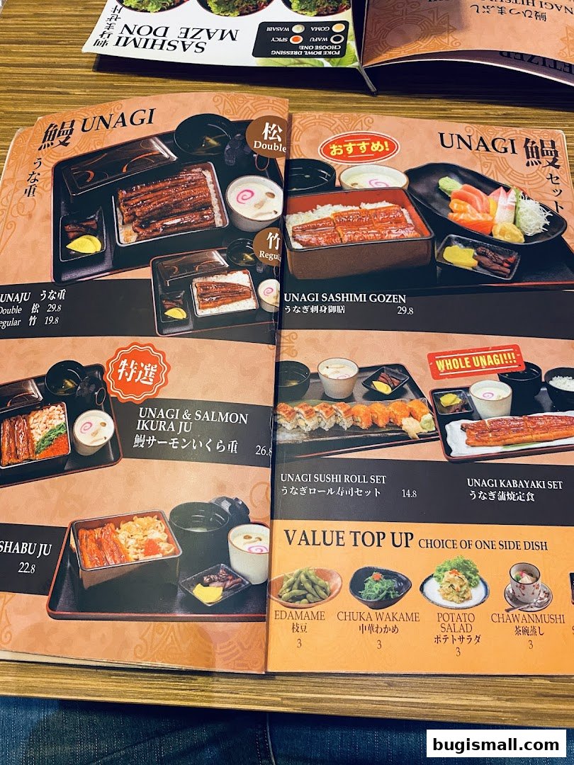 A menu from Una Una featuring Unagi dishes, sushi, and side options.