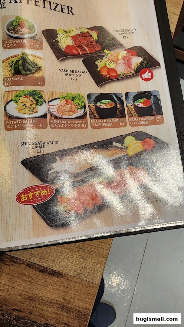 A menu page showcasing various Japanese appetizers with enticing food photography.