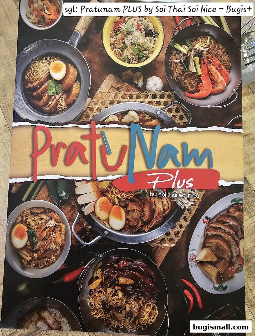 A vibrant display of various Thai noodle dishes and roasted meats from Pratunam PLUS.