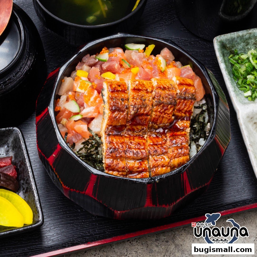 A delicious bowl of chirashi sushi with grilled eel and fresh seafood.